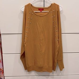 Sweater. Cold shoulder light sweater. Dark mustard